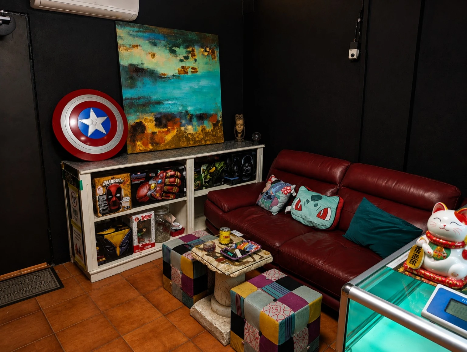 Red sofa and collectibles at PK1413